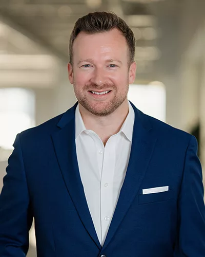 A business headshot of Fabian Knopfler, Lead financial advisor at Lions Wealth Partners, one of the best financial management firms in Indianapolis, Indiana